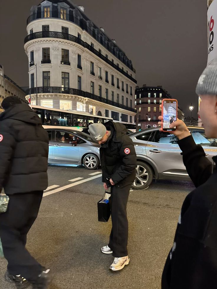 Cold Front: black puffer jacket and beanie at night